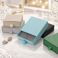 Boîte cadeau en papier magnétique noire personnalisée avec logo, emballage de bijoux, et boîte intérieure octogonale en velours, très populaire pour la vente en gros