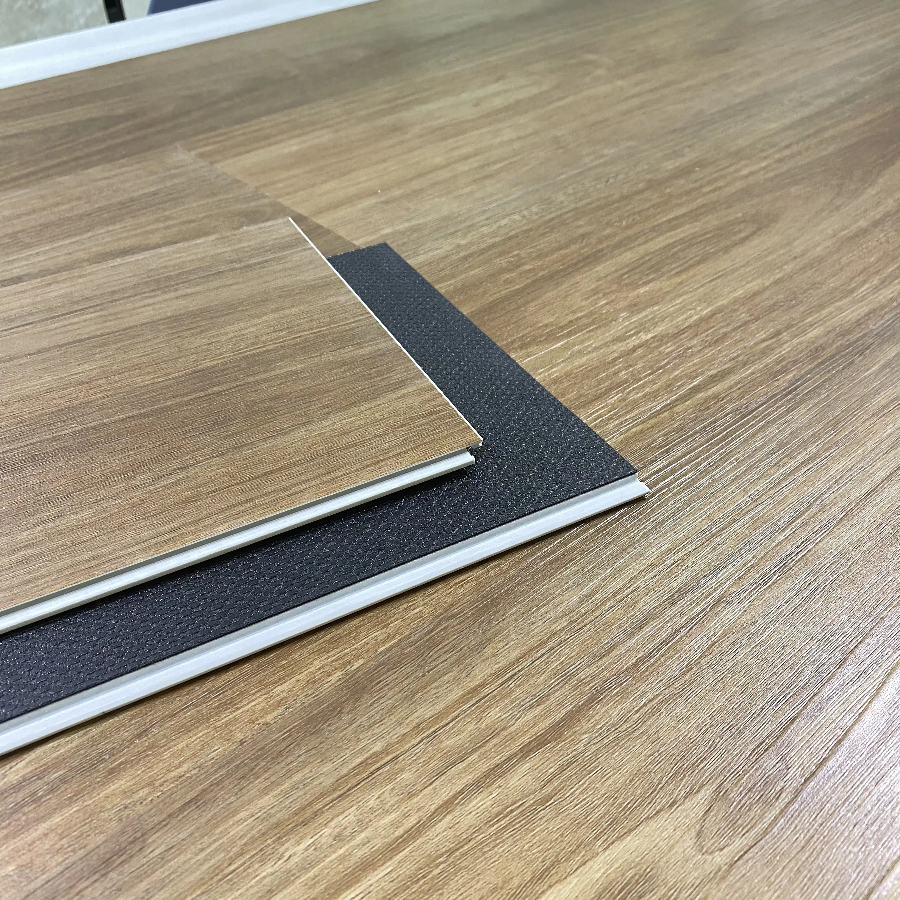 New vinyl flooring cheap and high quality 4mm laminated wood texture machine waterproof vinyl plank spc flooring