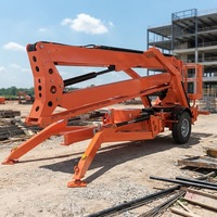 Plateforme élévatrice articulée remorquable robuste avec système hydraulique stable pour des travaux à grande hauteur dans les entrepôts et sur les chantiers de construction