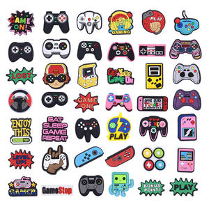 Venta al por mayor de dibujos animados de PVC de plástico suave parche DIY accesorios de la caja del teléfono celular con música y estilos religiosos zapatos de muñeca plana y dijes - Product Image 1