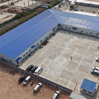 Bâtiments industriels en acier de style chinois, conçus sur mesure par une usine professionnelle, pour entrepôts et hangars métalliques.