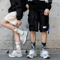 Chaussettes en coton à tube moyen avec logo personnalisé pour femmes Chaussettes en coton à tricoter à la mode street funky Chaussettes de sport unisexes brodées