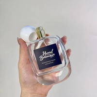 Flacon de parfum en verre transparent rectangulaire de luxe, vide, blanc, avec pulvérisateur à pompe sérigraphié givré, 100 ml, OEM/ODM en stock