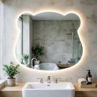 Miroir intelligent de salle de bain LED de forme irrégulière moderne, anti-buée, à intensité variable, rétroéclairé, avec commande tactile