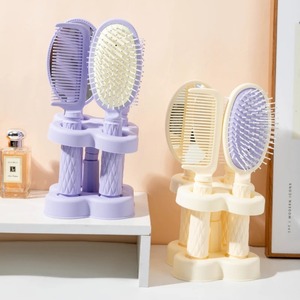 Juego de peines de espejo de cuatro piezas con base, peine de aire de alta gama, peine de cerdas de alto valor, peine especial para el cuidado del cabello femenino, peine para dar volumen - Product Image 6