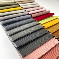 Tissu de canapé de luxe textile pour la nouvelle mode Matière première confortable en velours côtelé Tissu d'ameublement en velours côtelé uni en polyester pour canapé