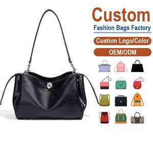 กระเป๋าสะพายหนังแท้ฟูลเกรน พื้นผิวเรียบเนียน ดูหรูหรา พร้อมความเงางามแบบกระจก ดีไซน์เรียบง่ายทันสมัย - Product Image 1