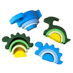 Nuovo Design per bambini giocattoli impilabili in Silicone a forma di dinosauro educativo impilatore con Logo personalizzato pacchetto di blocchi impilabili giocattolo