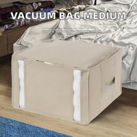 Sac de rangement sous vide compact de taille moyenne, format carré, pour vêtements, oreillers et autres articles.