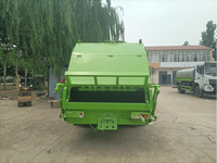 Camion à ordures Dongfeng robuste, compacteur 4x2 à rapport de compression 1 à 3, chargeur arrière, anti-fuite, fonctionnement stable