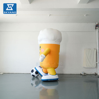 Modèle de tasse à bière gonflable personnalisée en forme de ballon de football de dessin animé pour événements sportifs en plein air, publicité promotionnelle, décoration