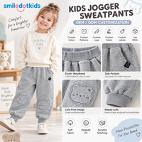Pantalon de jogging pour enfants en molleton doux avec applique ours gris et revers, fabrication OEM/ODM personnalisée en gros pour tout-petits filles