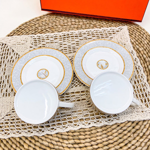 Hot Sale Nordic Luxury Gold Handle Vertical Pattern Ceramic <b>Tea</b> <b>Cup</b> and Saucer <b>Set</b> - Product Image 1