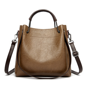 High Capacity Hot Sale Fashion PU <b>Bags</b> Travelling Solid Color Pu Leather Handbag for Women Big Capacity Tote Shoulder <b>Bags</b> - Product Image 1