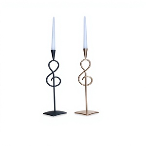Ensemble de bougeoirs modernes en métal noir et or, support pour bougies coniques, décoration d'intérieur, design durable. - Product Image 1