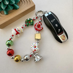 ¡Dios Mío! Esta Cadena para Teléfono con Forma de Donut de Muñeco de Nieve se Está Volviendo Tan Adorable - Product Image 2