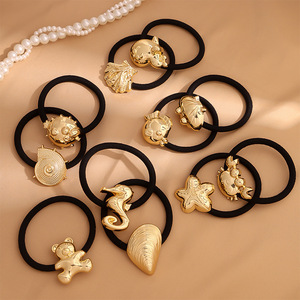 Bandes de cheveux élastiques noires avec des breloques d'animaux d'océan doré mignon alliage métal cheveux chouchous pour femmes enfants plage ton cheveux cravate - Product Image 1