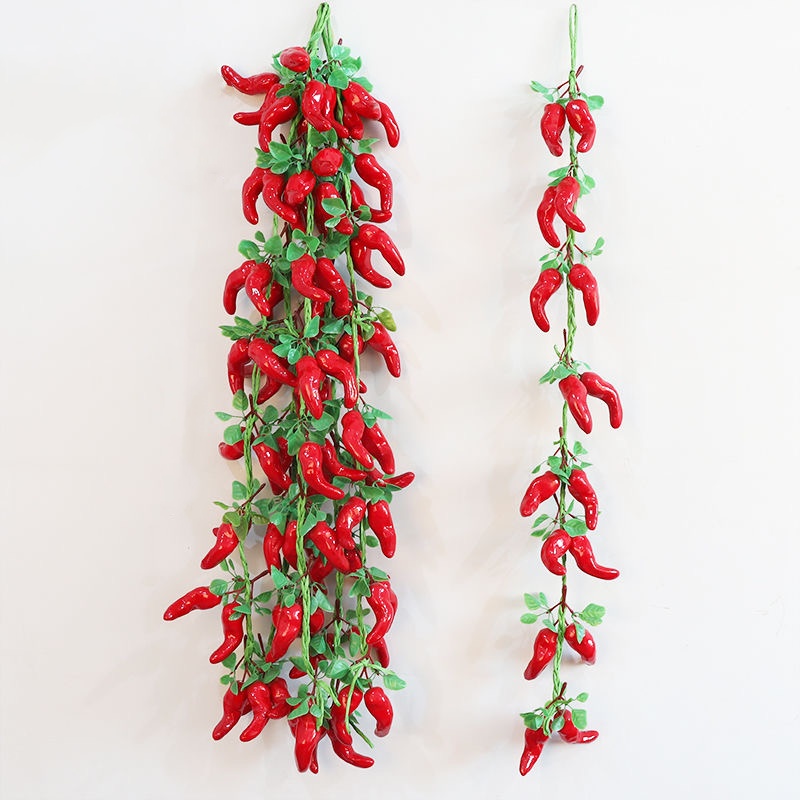 Brochette de poivrons courbés avec feuilles - rouge