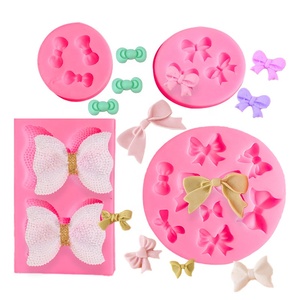Venta al por mayor forma <span class=keywords><strong>de</strong></span> lazo <span class=keywords><strong>fondant</strong></span> pastel decoración molde <span class=keywords><strong>de</strong></span> silicona herramienta <span class=keywords><strong>para</strong></span> hornear chocolate molde <span class=keywords><strong>de</strong></span> silicona <span class=keywords><strong>para</strong></span> niña <span class=keywords><strong>cumpleaños</strong></span> - Product Image 1