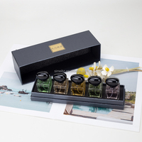 Boîte à parfum en carton de luxe personnalisée avec couvercle 30ml/50ml Boîte d'emballage en papier gaufré pour bouteille de parfum pour cosmétiques