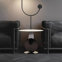 Table basse ronde de style minimaliste italien, symétrique, petite, au design artistique raffiné, luxe léger, table d'appoint