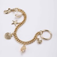 Nouveau design – Breloque de sac de luxe, porte-clés coquillage étoile de mer, pendentif en alliage et cristal, chaîne de sac