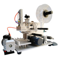Machine à étiquettes plate semi-automatique LX-T60 pour le carton en verre carré en plastique de boîte d'ANIMAL FAMILIER