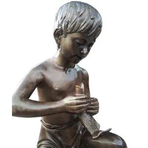 Stunning bronze boy with fish statue for Decor and Souvenirs 