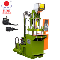 Machine de moulage par injection verticale automatique contrôlée par PLC hydraulique ZY-450ST pour la fabrication de supports de fiches en ABS/PP