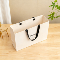 Sacs cadeaux en papier pliables de luxe personnalisés, échantillon gratuit, sacs de shopping écologiques de haute qualité pour mariage et fête