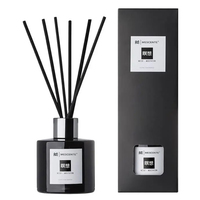 Mescente vente en gros bouteille en verre noir bâtons de rotin parfum naturel fleur huile essentielle diffuseur de roseau