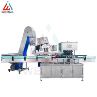 Machine de remplissage automatique pneumatique pour sprays corporels et bombes de peinture aérosol avec composant de pompe à noyau