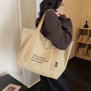 女式帆布手提包 休闲字母图案设计 大号单肩包 适合日常使用和购物 - Product Image 1