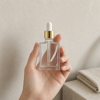 Vente en gros de flacons carrés en verre vides avec bouchon doré, flacon compte-gouttes transparent, emballage cosmétique, conteneur, fournitures