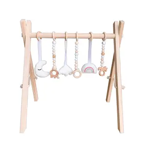 Gym bébé en bois avec 6 jouets suspendus de gymnastique bébé en bois, activité en bois pliable bébé jouer barre suspendue cadeau nouveau-né