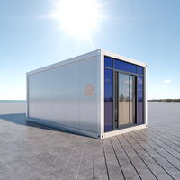Maison conteneur préfabriquée économique en kit, fabriquée en Chine, avec une pièce de vie et une porte vitrée mobile de 3m