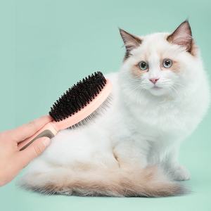 Brosse de massage double face confortable pour animaux de compagnie, pratique et autonettoyante, avec aiguille. - Product Image 2