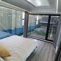 FoShan Usine OEM Meublé Capsule Conteneur Maison De Luxe Préfabriqué Mini Cabine pour Camping Restaurant Resort Chalet