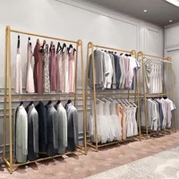 Présentoir autoportant moderne personnalisé à double couche en acier inoxydable, avec panneau en bois noir de luxe, roulettes amovibles et structure détachable