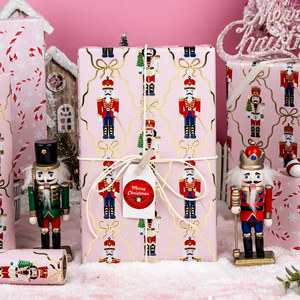 Reversible Christmas Wrapping Paper Roll 17 Inch X 33 Feet Metallic Foil <b>Nutcracker</b> Gold Row with <b>Pink</b> Candy Cane - Product Image 1