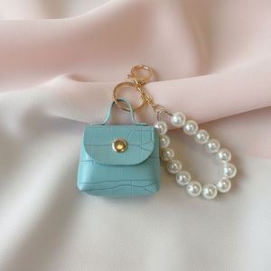 Pearl <b>Bag</b> Pendant Car Keychain Handmade <b>Mini</b> Earphone <b>Bag</b> Accessory PU Leather <b>Bag</b> Keychain with Pearl Wristlet - Product Image 4