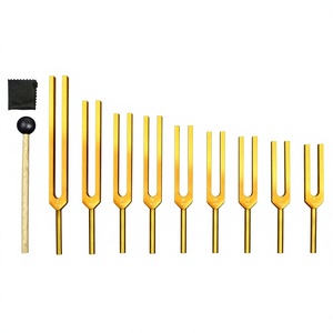 Juego Profesional de 9 Diapasones de Solfeggio en Tono Dorado con Martillo y Paño de Limpieza, Ideal para Meditación, Relajación y Yoga - Product Image 1