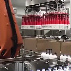 Robot tự động chọn và đặt chai trường hợp đóng gói