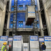 DAHAN SC200/200 0-40m/min Capacité 2000kg Hauteur max. 200m Élévateur de chantier à double cabine Commande PLC Moteur Engrenage Haute Performance