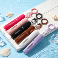 Bouteille de parfum suspendue en peluche 5 ml très populaire, porte-clés pompon girly, flacon de voyage rechargeable portable 5 ml sérigraphié