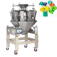 Machine d'emballage automatique pour dosettes de lessive et tablettes de lave-vaisselle avec peseuse multi-têtes et fonction de comptage