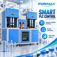 Machine de soufflage semi-automatique pour bouteilles PET, pour la fabrication de bouteilles d'eau minérale et de boissons