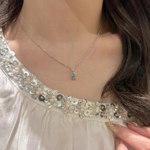 สร้อยคอเงินแท้ S925 ดีไซน์หรูหรา ประดับด้วยพลอยแซฟไฟร์ทรงรีสีขาวทอง พร้อมจี้รูปไข่นกพิราบ - Product Image 2