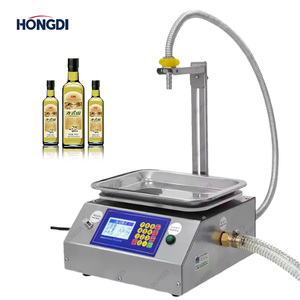 Mini machine de remplissage automatique de liquides à haute précision contrôlée par PLC pour les bouteilles alimentaires (miel, huile de cuisson, sauce) en verre/plastique - Product Image 2