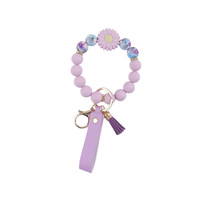 Silikonperlen-Schlüsselanhänger-Armband mit Gänseblümchen-Design, PU-Leder-Quastenband und Anti-Verlust-Funktion